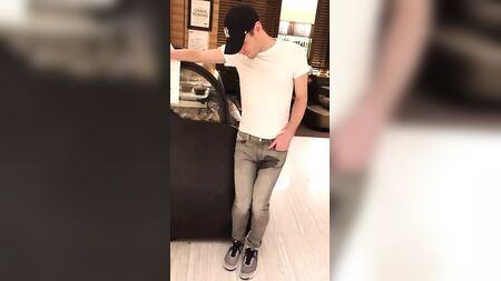 Boy piss in his pants in public