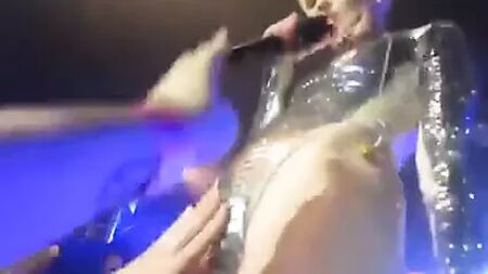 Sluty Miley Cyrus let's Fans touch her pussy