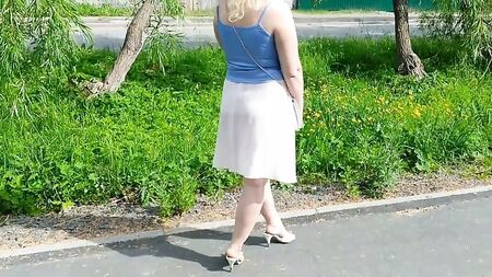 Sexy lady in light dress no bra