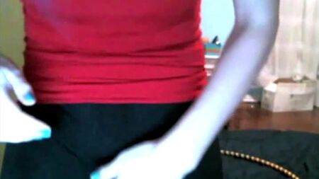 Cute girl wearing black cycle shorts showing cameltoe