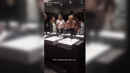 chloe playing with her tits in the girls washroom