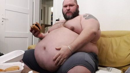 Superchubby SOC - fat guy eating a big burger & onion rings