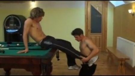 Surfer dude plays with cute guy