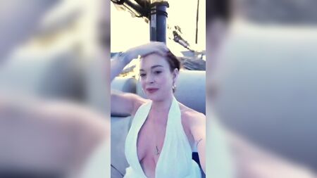 Lindsay Lohan (Cleavage) Nip Slip