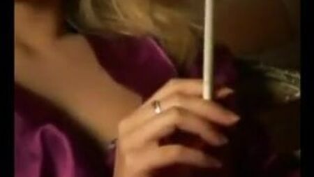 Smoking in satin robe